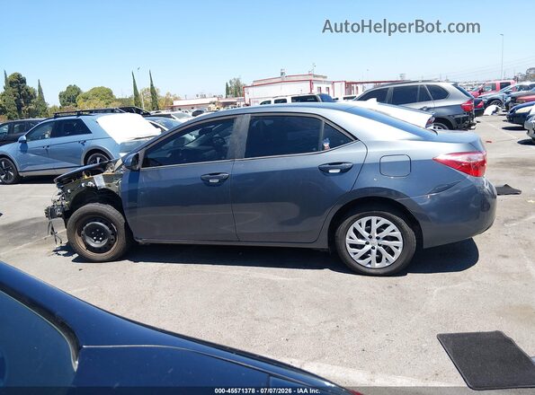 5YFBURHE6KP934903 2019 TOYOTA COROLLA Серый 