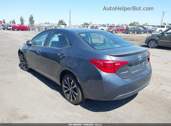 5YFBURHE7HP696665 2017 TOYOTA COROLLA Gray Rear left