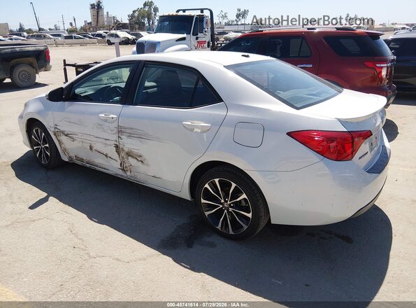 5YFBURHE7KP926809 2019 TOYOTA COROLLA White Tył lewy
