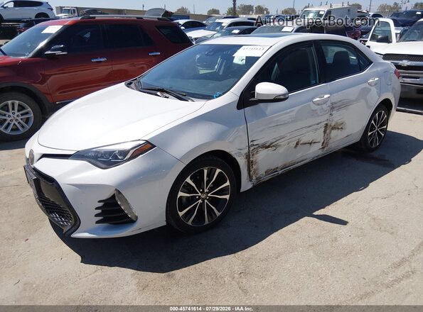 5YFBURHE7KP926809 2019 TOYOTA COROLLA White Przód lewy
