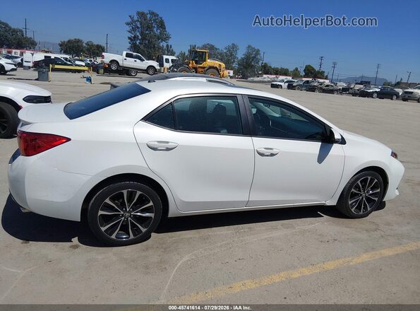 5YFBURHE7KP926809 2019 TOYOTA COROLLA White Widok wnętrza z tyłu