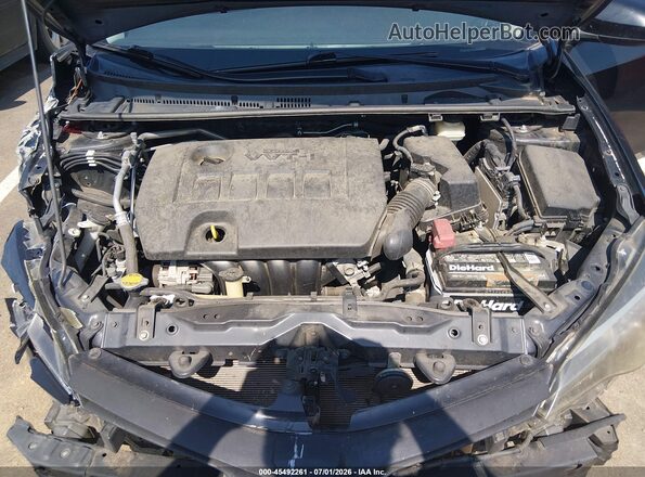 5YFBURHE8HP586983 2017 TOYOTA COROLLA Черный Вид сзади