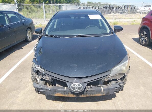 5YFBURHE8HP586983 2017 TOYOTA COROLLA Черный Вид задней части салона