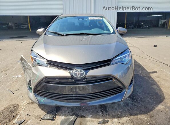 5YFBURHE8HP600977 2017 TOYOTA COROLLA Желто-коричневый Вид спереди