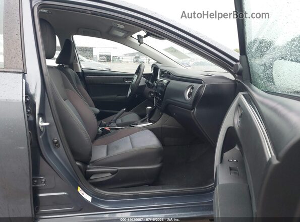 5YFBURHE8HP646230 2017 TOYOTA COROLLA Gray წინა სალონის ხედი