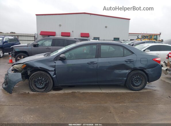 5YFBURHE8HP646230 2017 TOYOTA COROLLA Gray 