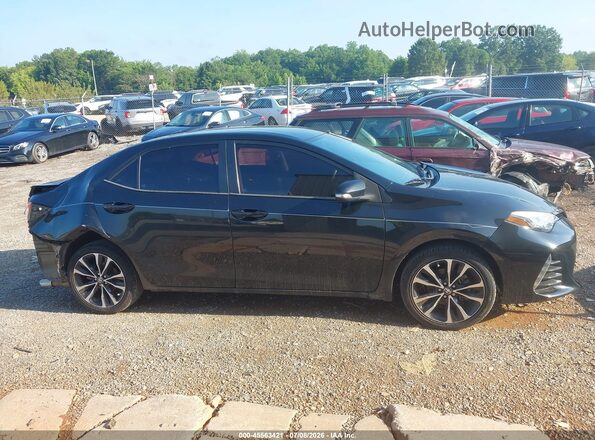 5YFBURHE8KP879449 2019 TOYOTA COROLLA Черный Вид задней части салона