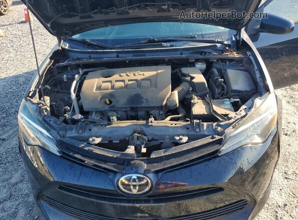 5YFBURHE8KP920436 2019 TOYOTA COROLLA Black Սալոնի հետևի տեսք