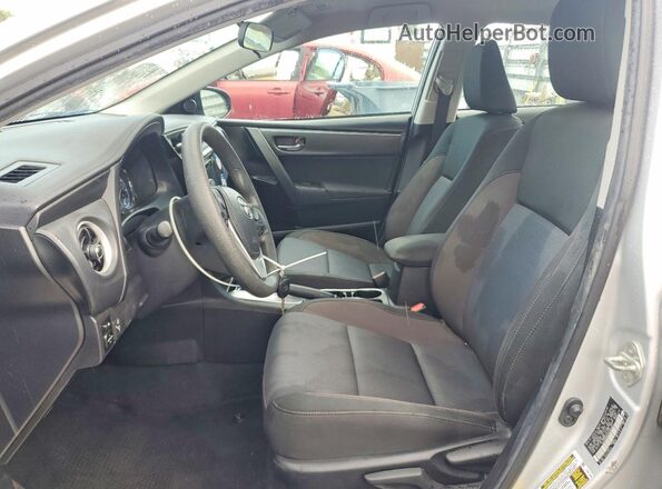 5YFBURHE8KP945952 2019 TOYOTA COROLLA Silver Սալոնի դիմացի տեսք