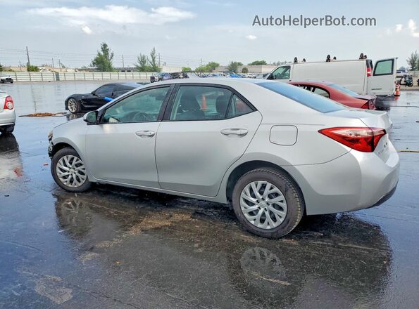 5YFBURHE8KP945952 2019 TOYOTA COROLLA Silver Հետևի ձախ