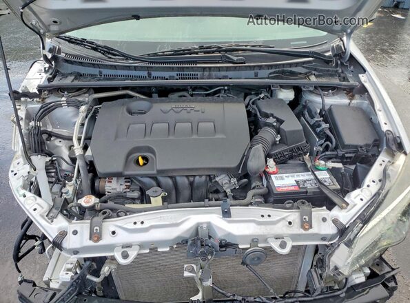 5YFBURHE8KP945952 2019 TOYOTA COROLLA Silver Սալոնի հետևի տեսք