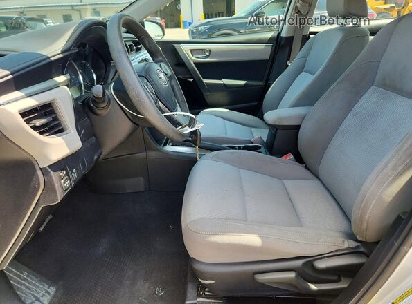 5YFBURHE9GP446097 2016 TOYOTA COROLLA Gray Vista interior delantera