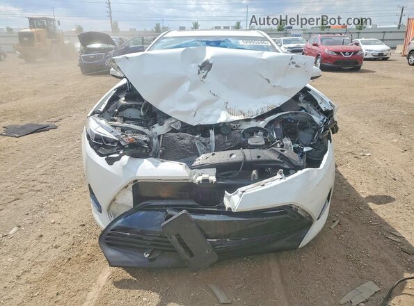 5YFBURHE9HP650688 2017 TOYOTA COROLLA White Vista frontal