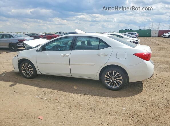 5YFBURHE9HP650688 2017 TOYOTA COROLLA White Trasero izquierdo