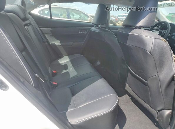 5YFBURHE9HP650688 2017 TOYOTA COROLLA White Vista de los asientos traseros