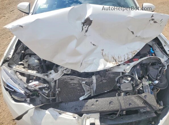 5YFBURHE9HP650688 2017 TOYOTA COROLLA White Vista interior trasera
