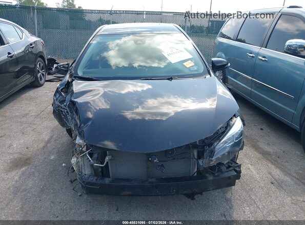 5YFBURHE9KP898978 2019 TOYOTA COROLLA Черный Вид задней части салона