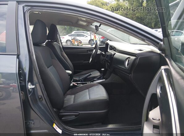 5YFBURHE9KP914015 2019 TOYOTA COROLLA Синий Вид салона спереди