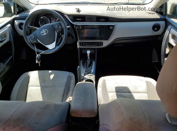 5YFBURHE9KP938654 2019 TOYOTA COROLLA Серебряный Вид панели приборов