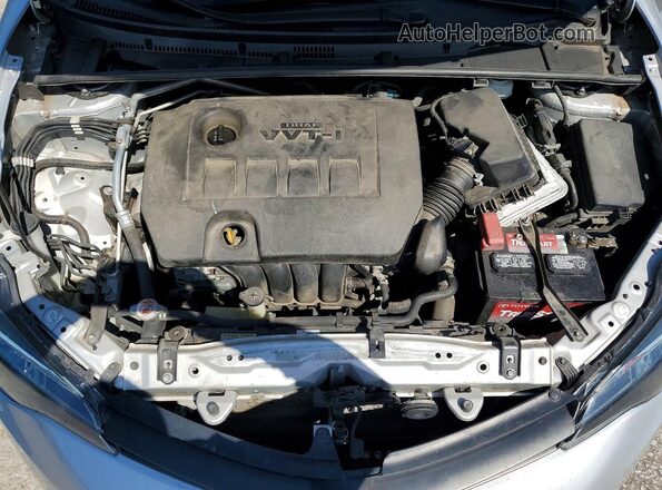 5YFBURHE9KP938654 2019 TOYOTA COROLLA Серебряный Вид задней части салона