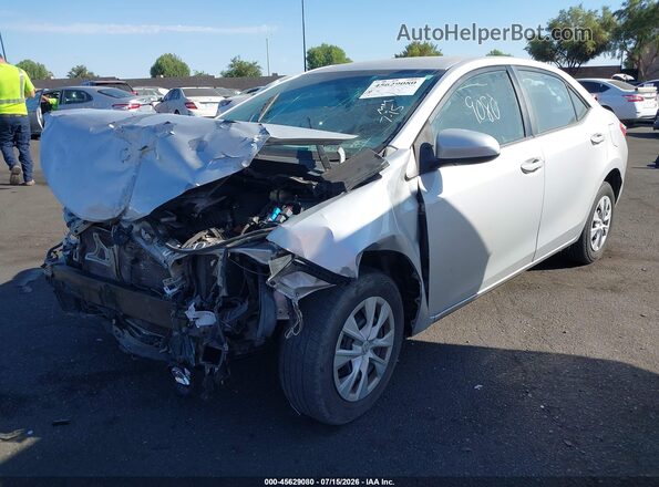 5YFBURHEXGP460705 2016 TOYOTA COROLLA Silver Առջևի ձախ երեք քառորդ տեսարան