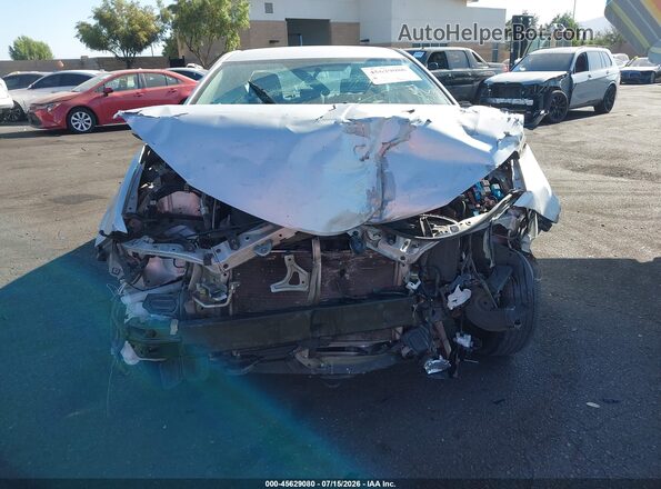 5YFBURHEXGP460705 2016 TOYOTA COROLLA Silver Սալոնի հետևի տեսք