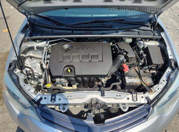 5YFBURHEXGP475219 2016 TOYOTA COROLLA Серебряный Вид задней части салона