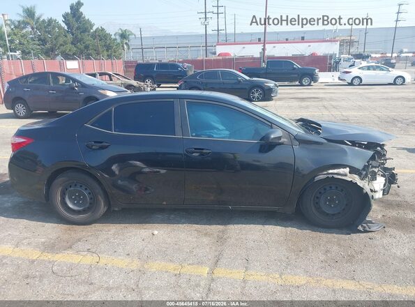 5YFBURHEXHP705309 2017 TOYOTA COROLLA Black Սալոնի հետևի տեսք