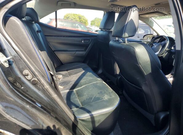 5YFBURHEXHP706248 2017 TOYOTA COROLLA Black Vista de los asientos traseros