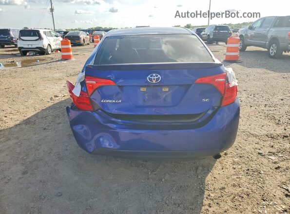 5YFBURHEXJP827366 2018 TOYOTA COROLLA Синий Вид сзади