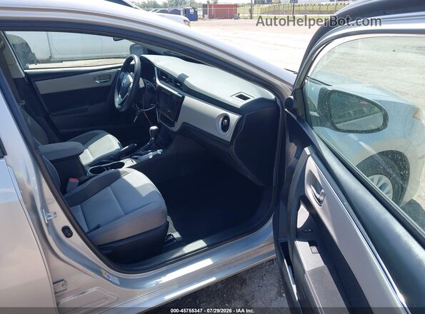 5YFBURHEXKP891747 2019 TOYOTA COROLLA Серебряный Вид салона спереди