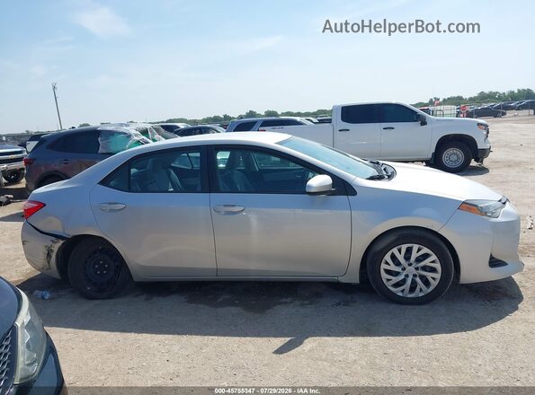 5YFBURHEXKP891747 2019 TOYOTA COROLLA Серебряный Вид задней части салона