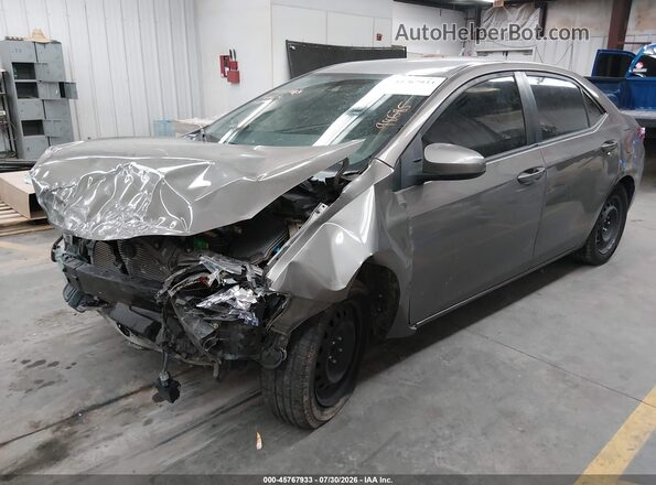 5YFBURHEXKP900284 2019 TOYOTA COROLLA Gold Передня ліва чверть
