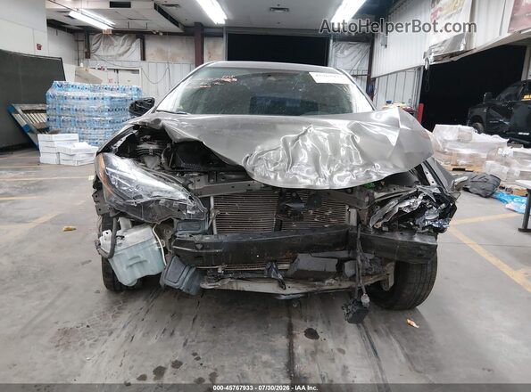 5YFBURHEXKP900284 2019 TOYOTA COROLLA Gold Вид спереду