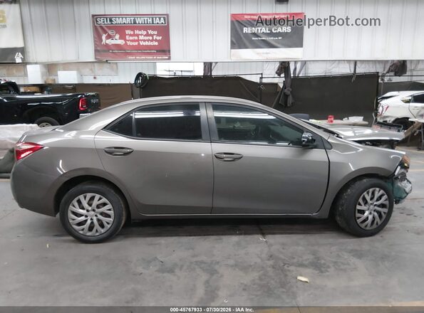 5YFBURHEXKP900284 2019 TOYOTA COROLLA Gold Вид задньої частини салону