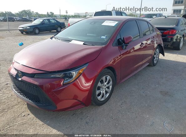 5YFEPMAE0NP381915 2022 TOYOTA COROLLA Burgundy Vista tres cuartos delantera izquierda