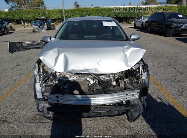 5YFEPMAE1NP326048 2022 TOYOTA COROLLA Silver Vista interior trasera