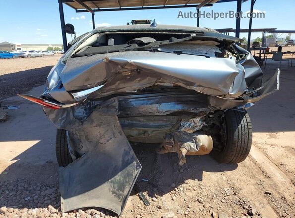5YFEPMAE3NP275040 2022 TOYOTA COROLLA Gray Rear view