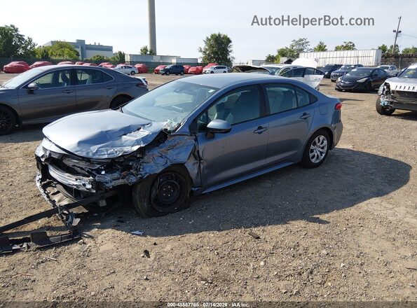 5YFEPMAE4MP163670 2021 TOYOTA COROLLA Light Blue Передняя левая четверть