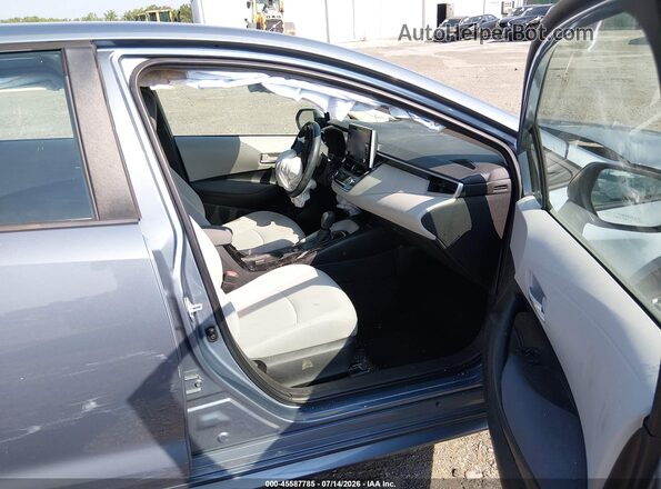 5YFEPMAE4MP163670 2021 TOYOTA COROLLA Light Blue Вид салона спереди