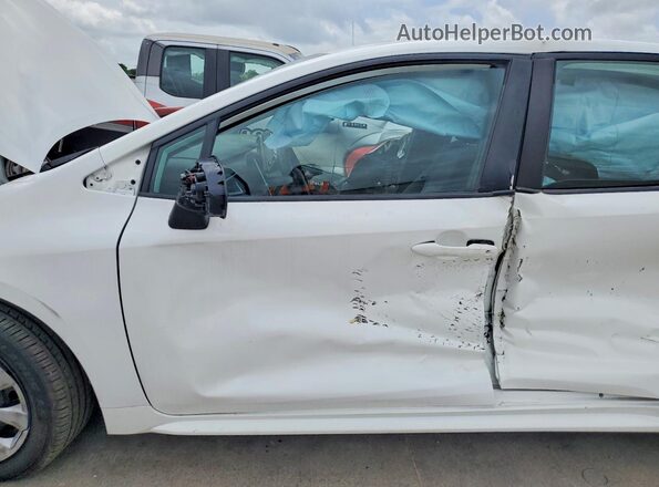 5YFEPMAE4MP232485 2021 TOYOTA COROLLA Белый Вид салона спереди
