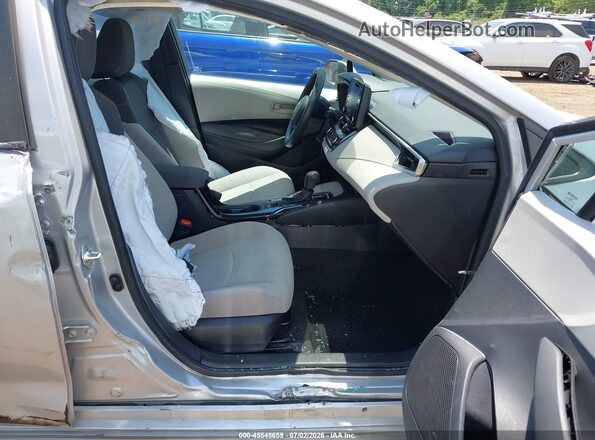 5YFEPMAE6NP327356 2022 TOYOTA COROLLA Silver Vista interior delantera