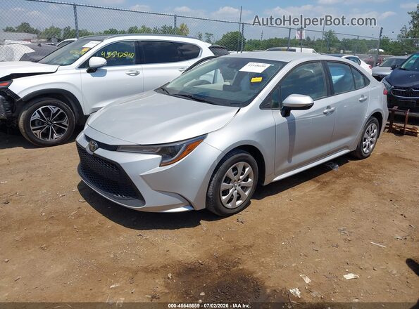 5YFEPMAE6NP327356 2022 TOYOTA COROLLA Silver Vista tres cuartos delantera izquierda