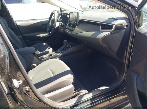 5YFEPMAE9NP299682 2022 TOYOTA COROLLA Black Widok wnętrza z przodu