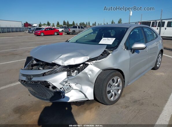 5YFEPMAEXMP223113 2021 TOYOTA COROLLA Silver Vista tres cuartos delantera izquierda