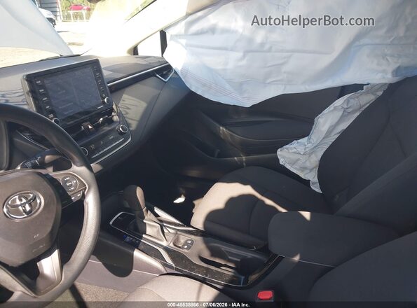 5YFEPMAEXNP385258 2022 TOYOTA COROLLA Silver Front interior view
