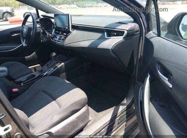 5YFS4MCE1MP060019 2021 TOYOTA COROLLA Black Front interior view
