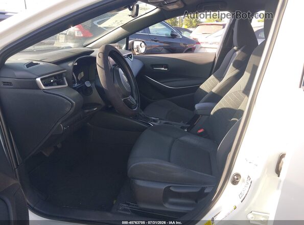 5YFS4MCE1MP065852 2021 TOYOTA COROLLA White წინა სალონის ხედი