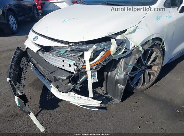 5YFS4MCE1MP065852 2021 TOYOTA COROLLA White ხელსაწყოთა პანელის ხედი
