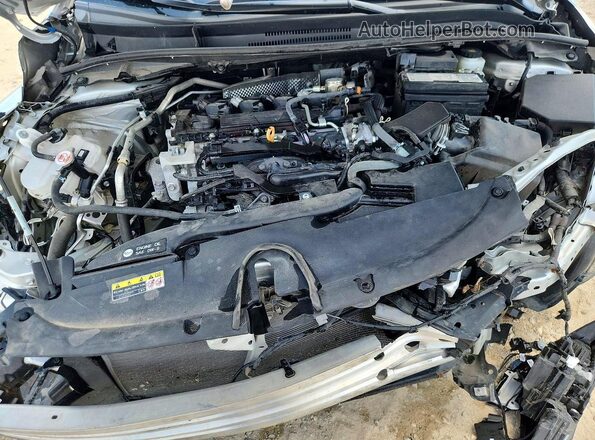 5YFS4MCE3RP211174 2024 TOYOTA COROLLA Silver Սալոնի հետևի տեսք